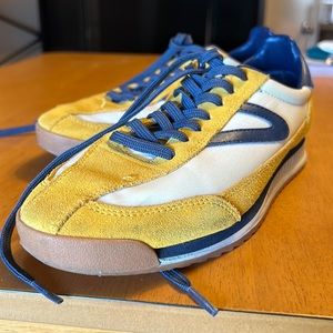 Tretorn, size 9. Needs an insole for the left shoe! Worn twice.